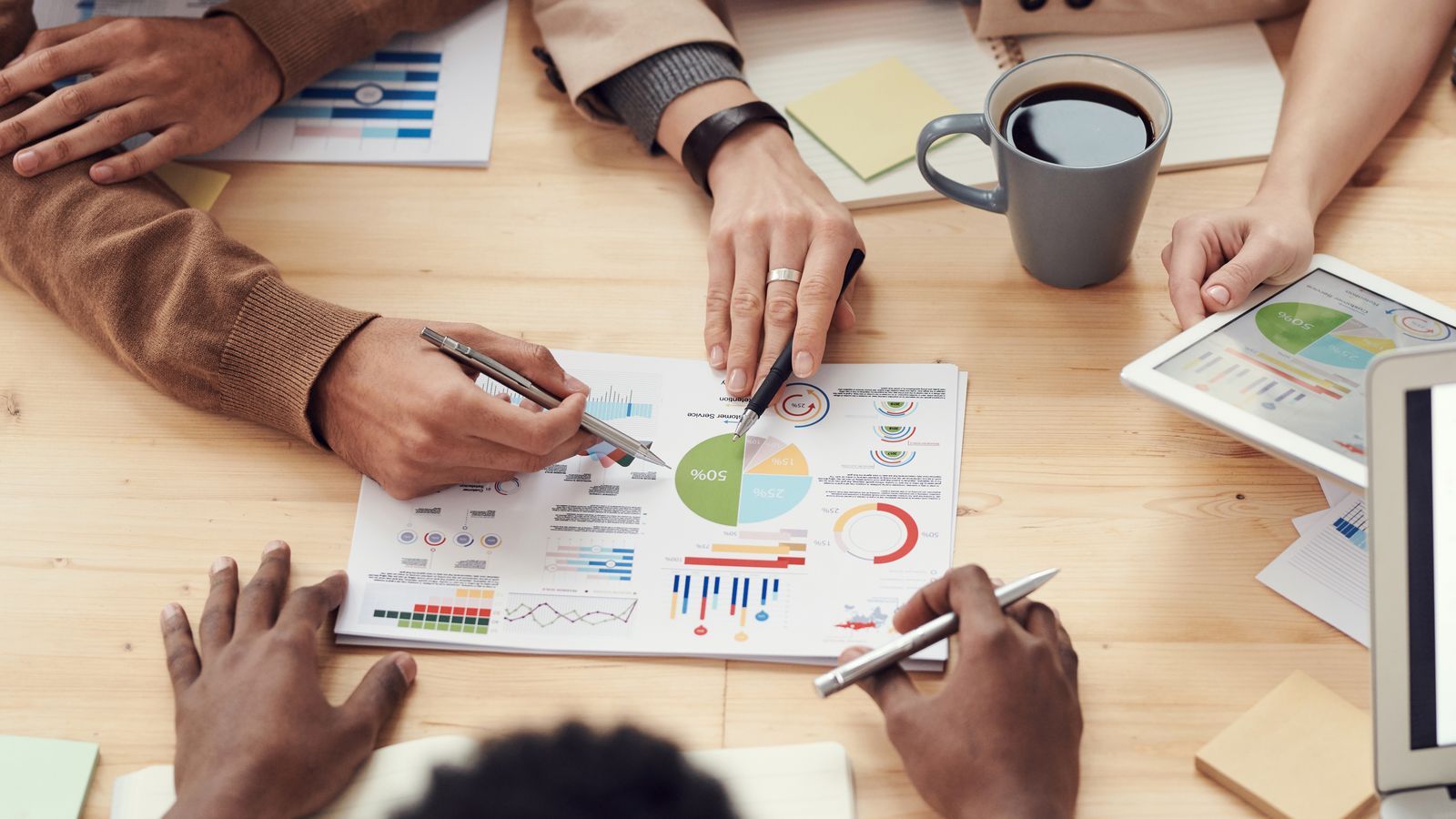 Advisors reviewing a business's financials together